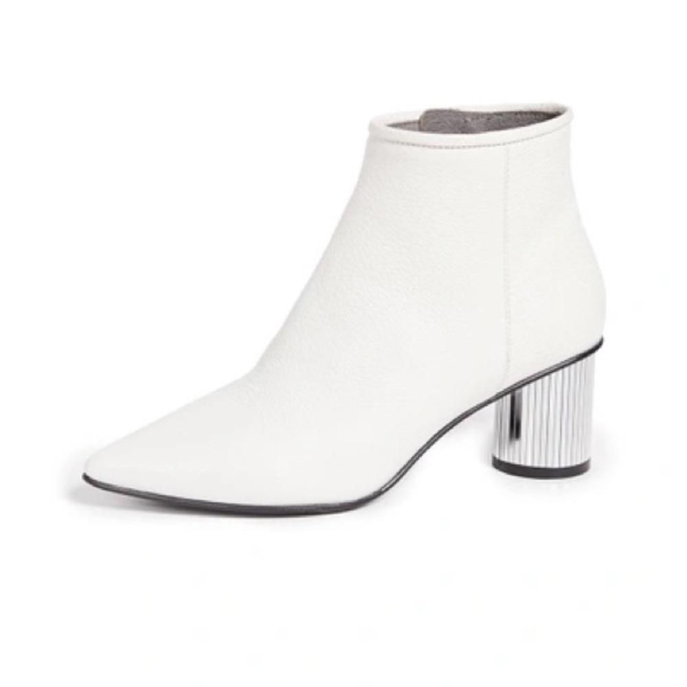 White leather boots with mirrored heel. By Pedro Garcia